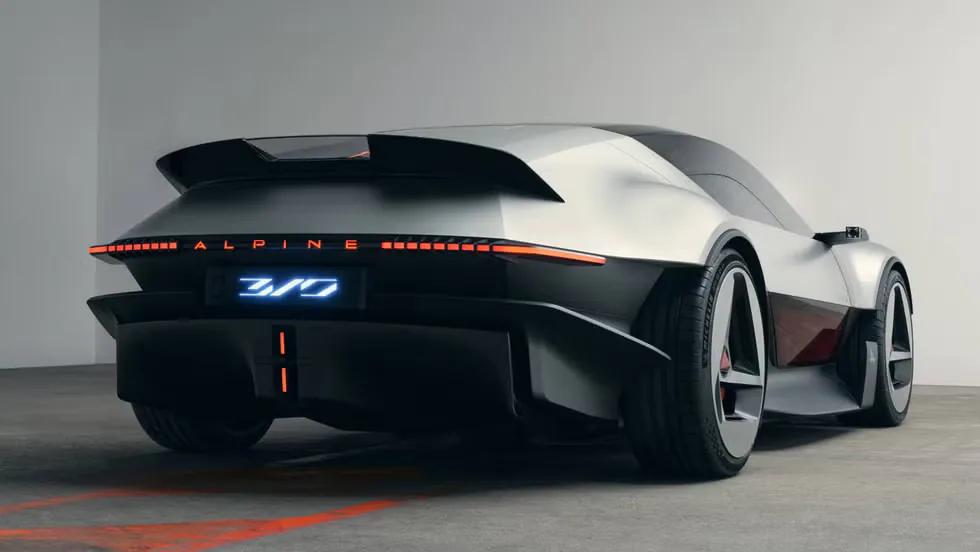 Futuristic Alpine sports car viewed from the rear, highlighting its sleek design and prominent tail lights.